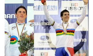 Peter Kennaugh and Ben Swift collecting their rainbow jersey
