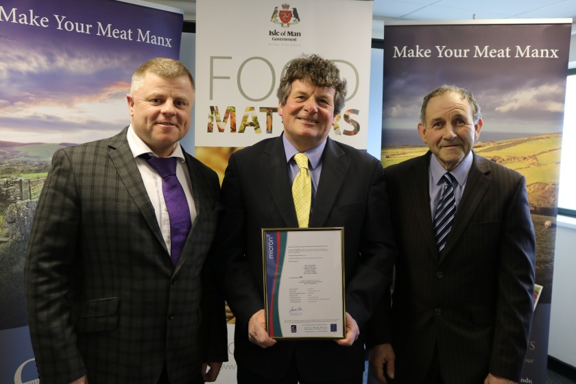 Mr Cretney MLC (centre), Member of DEFA, presenting the BRC AA certification to Allan Skillicorn, Chairman of Isle of Man Meats (right) and Mike Owen, Chief Executive.