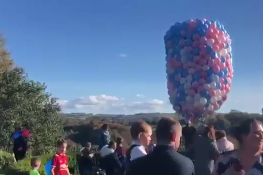 Balloons were released over Belfast