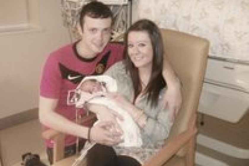 Stevie-Lea Evans with her fiancee and their new baby