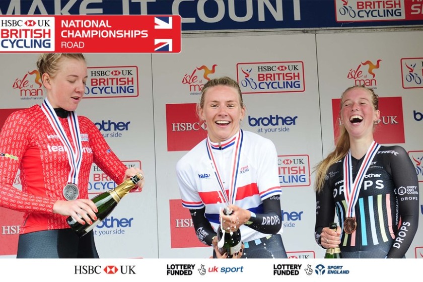 Anna Christian (centre) celebrates winning the under-23 women's British time trial (picture from British Cycling)