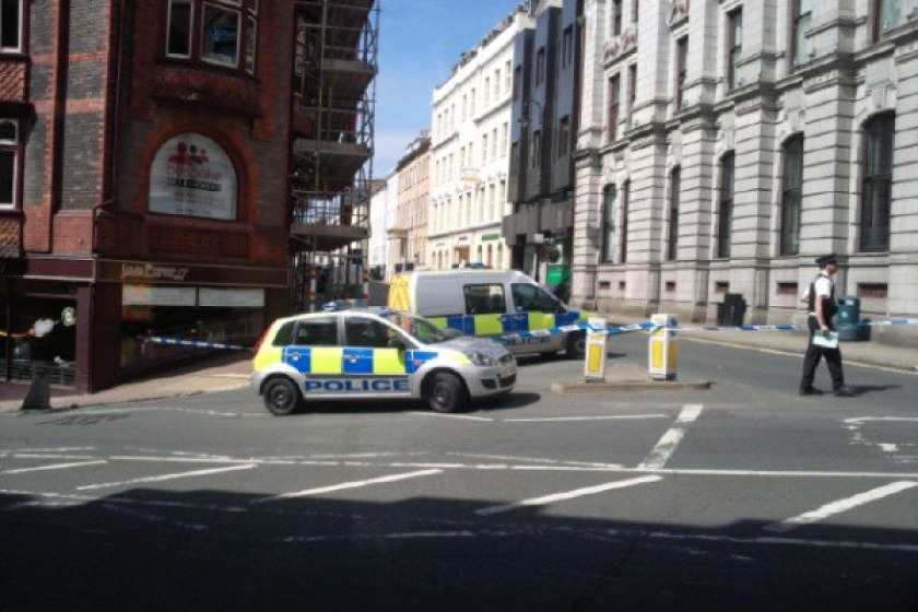 The police cordon on Athol Street yesterday
