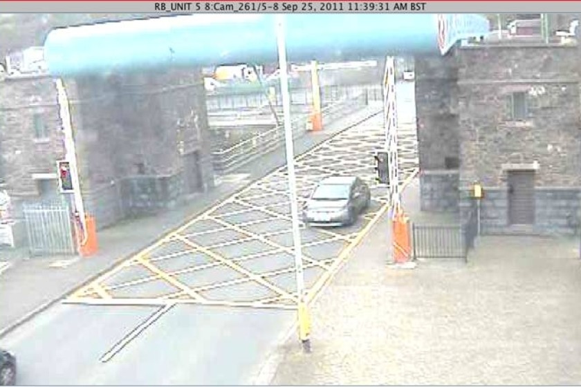 CCTV from the lifting bridge shows a car ignoring the red light