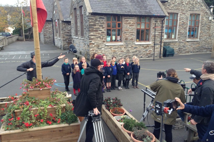 Pupils from the Bunscoill Ghaelgagh filming programme announcements for Channel 4 earlier this month.