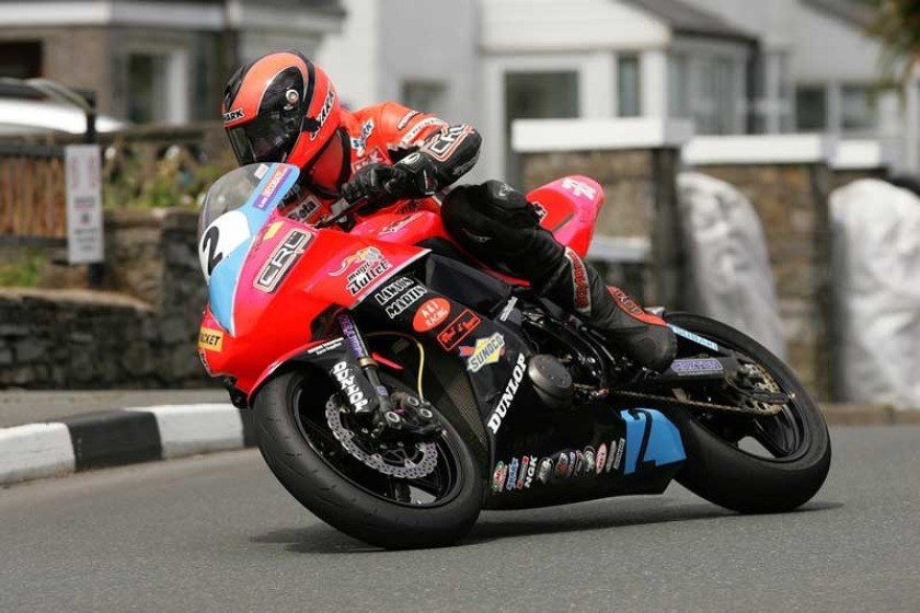 Ryan Farquhar passing a section of black and white kerb on the Billown course (photo by Pacemaker Press)