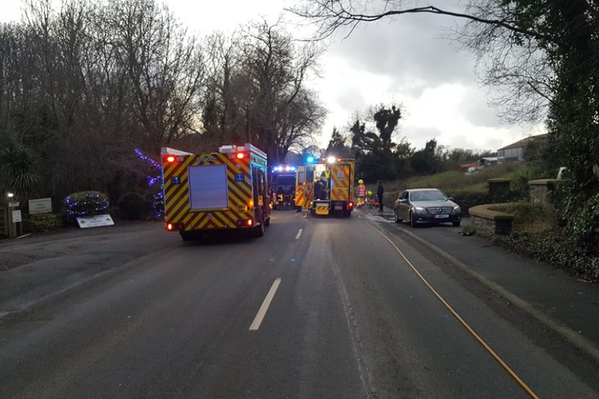 The emergency services at the scene of the crash yesterday.