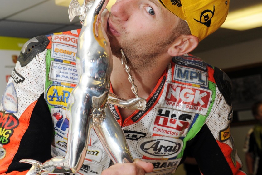 Ian Hutchinson with the Supersport trophy yesterday