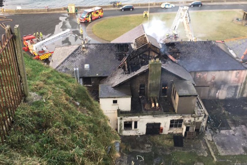 The fire mainly affected the first floor and roof at the Marine Biological Station in Port Erin (picture from Port Erin Coastguard)