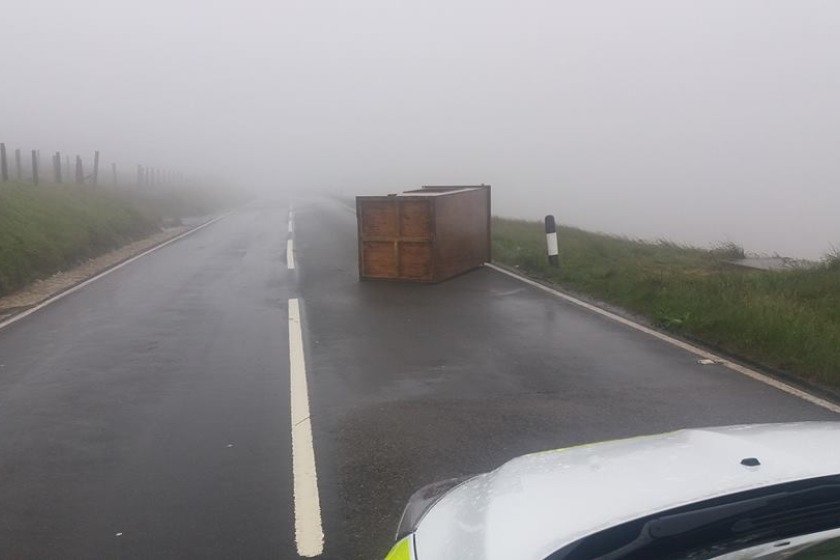 A marshall hut was blown onto the Mountain Road earlier this morning.