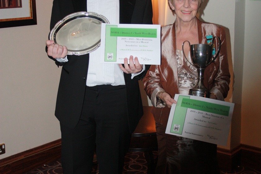 Iain Dixon and Val Cowley with their awards