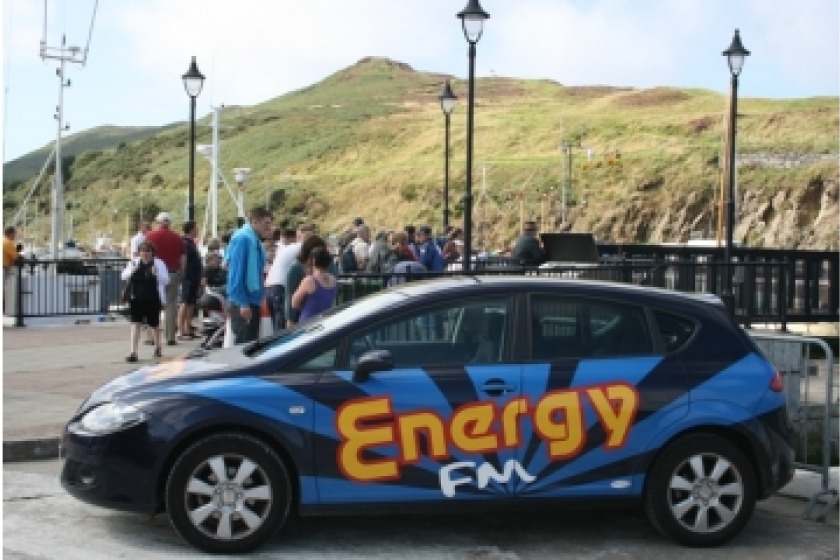 Peel footbridge behind the Energy FM car