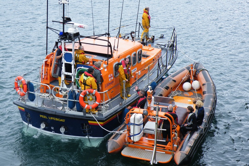 Sea Eagle being towed by Peel Lifeboat