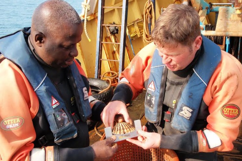Victor Kargbo with sea fisheries officer John Summer