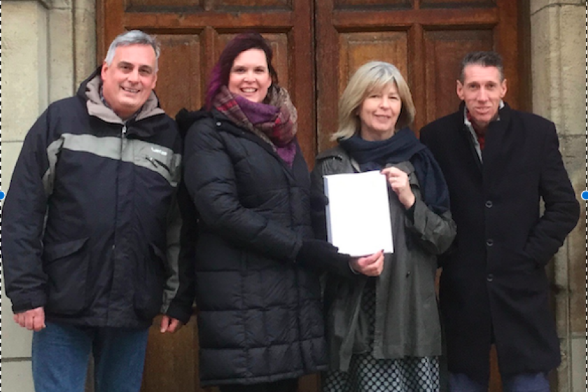 Representatives from the four organisations behind the petition present the signatures to the Manx Government.