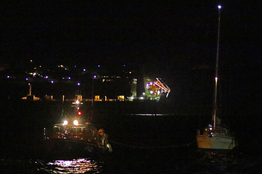Douglas lifeboat crew tows the yacht into Douglas harbour (photo courtesy of Michael Howland/RNLI)