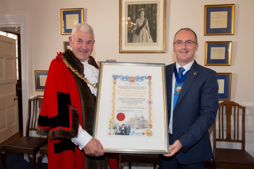 Cllr David Christian presented with his award from the Mayor of Douglas Jon Joughin.